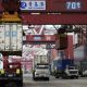 Chinese Exports Slow Their Decline; Imports Increase