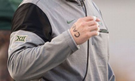 Kendal Briles coaches Baylor with dad Art's initials on hands