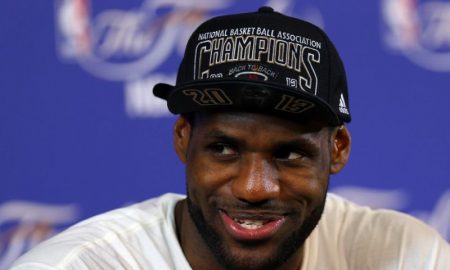 NBA star 'King' James endorses Clinton for president