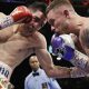 Santa Cruz scores majority decision to take Frampton's title belt and set up a rubber match