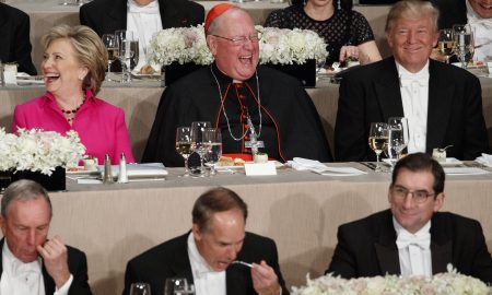 Trump booed as he rips into Clinton at Catholic charity dinner